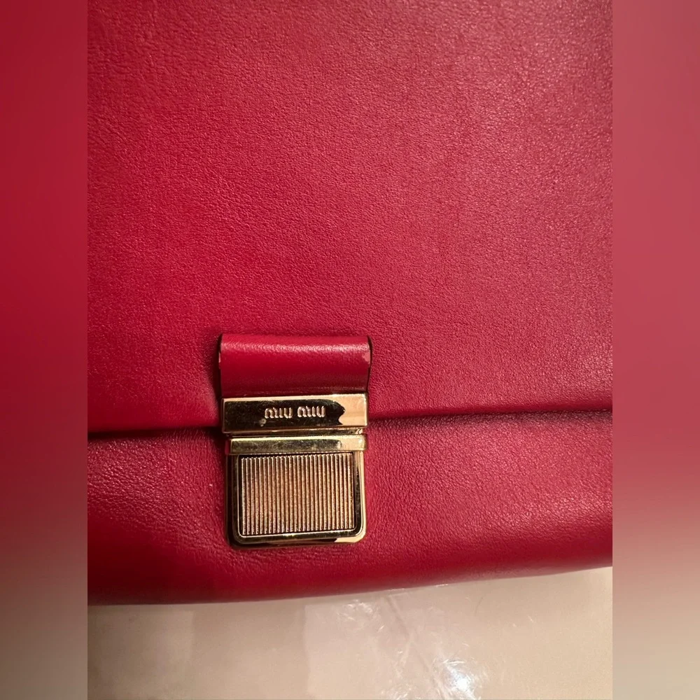 Very rare Miu Miu $2500 Authentic Red Leather Chain Handle Shoulder Bag.